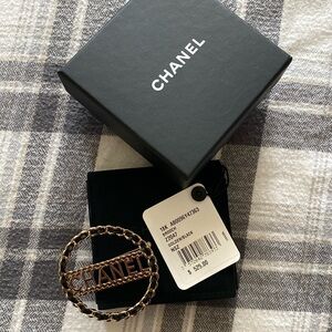 Chanel black and gold broach